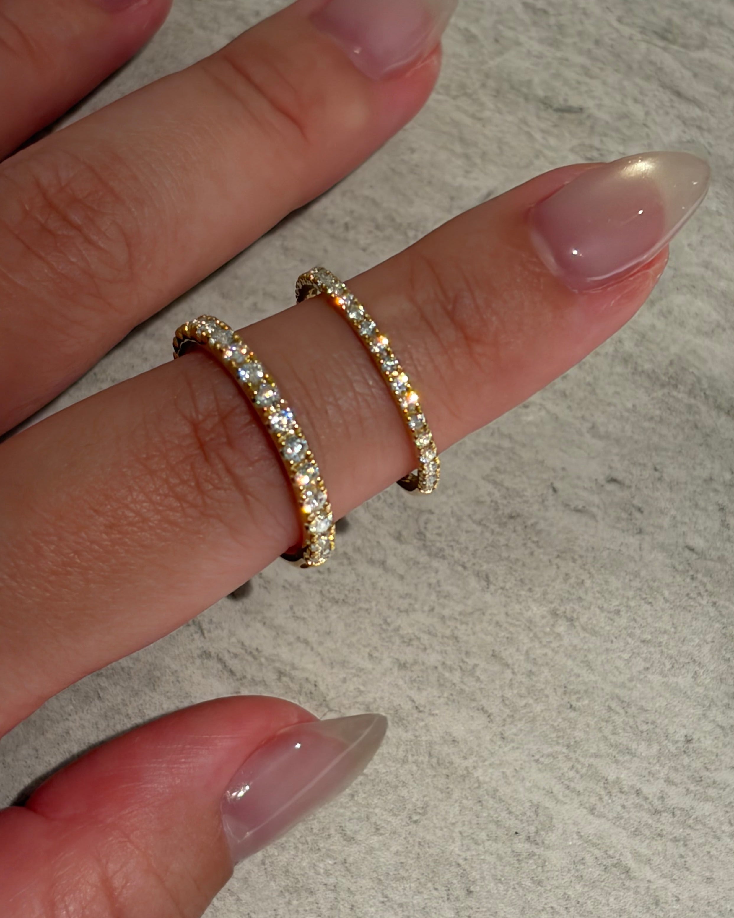 the Milestone Half Eternity Ring